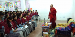 Photo of Khenpo Nimashar interacting with youth participants