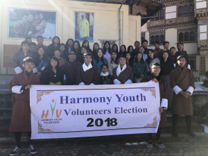 Group photo of youth volunteers outside DYS auditorium.